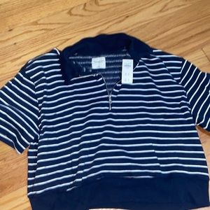 Short sleeve Sweater material shirt. Size XL.